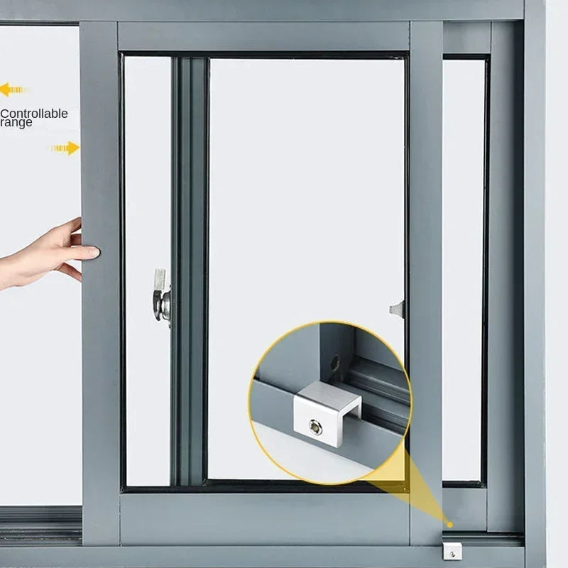 Close-up of an aluminum alloy sliding window lock mechanism with a hex key security stopper installed in a gray frame.