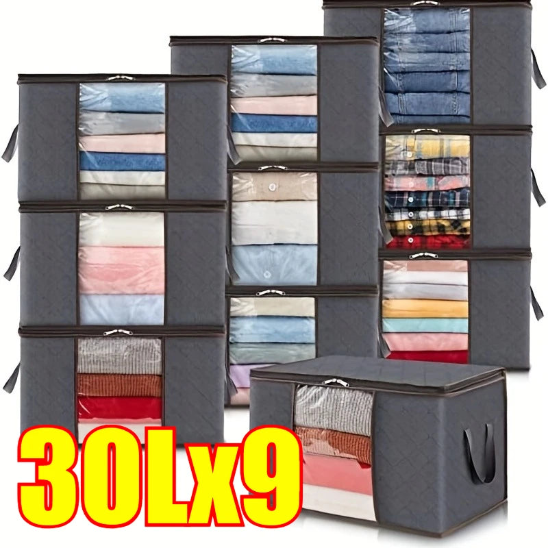 Nine dark gray storage bags with transparent windows filled with folded textiles like quilts and blankets