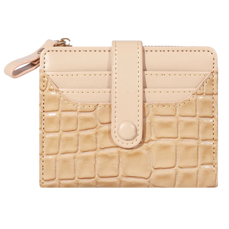 A beige PU leather wallet with a flap closure and double-zip, featuring a crocodile texture.