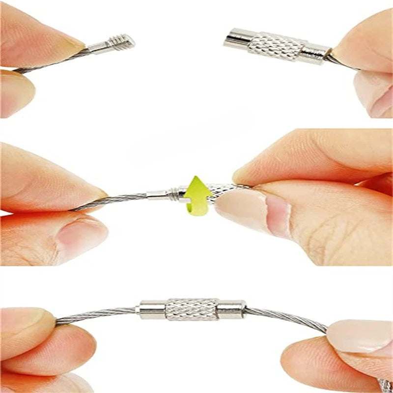 Stainless steel wire keychain cable with screw lock being held by fingers