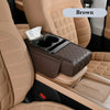 Brown car armrest cushion with cup holders and storage visible in a beige interior.