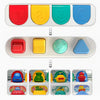 A set of four colorful pop-up animal sensory toys for babies, featuring red, yellow, green, and blue animals.