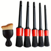 A set of black car detailing brushes with soft bristles for interior and wheels