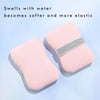 A pink foaming soap saver bag with a silver mesh strip is shown on a white background.