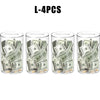 Four clear acrylic piggy banks filled with US dollar bills and coins.