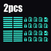 Two sets of glow-in-the-dark car window switch stickers, showing various lock and unlock icons.