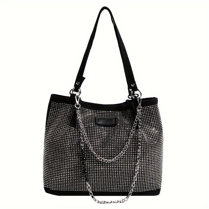 A black crystal-embellished chain shoulder bag with a long strap.