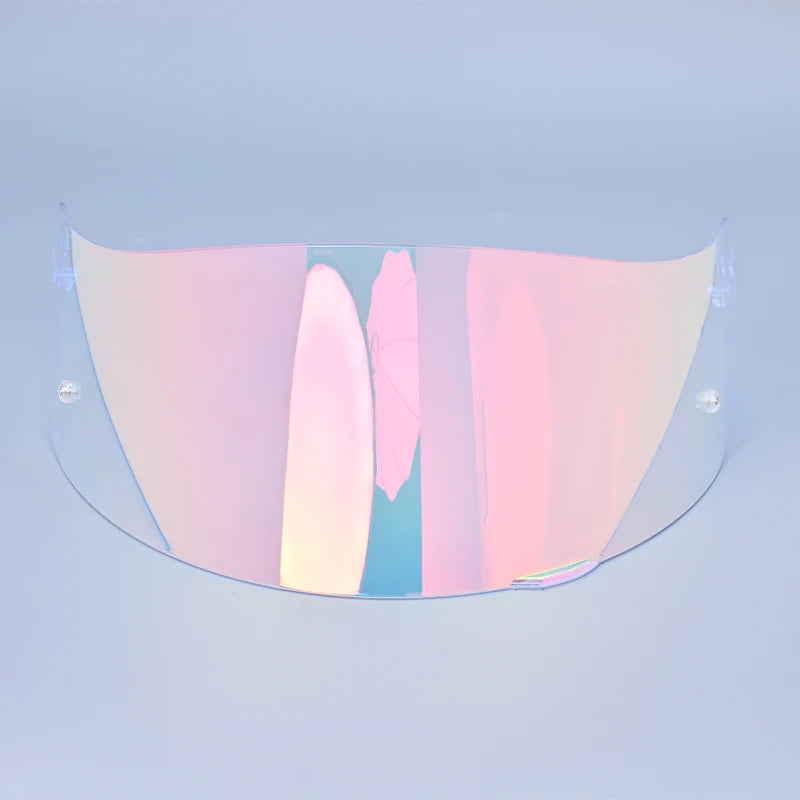 A transparent motorcycle helmet visor lens shield displaying a gradient of pink, orange, and blue colors.