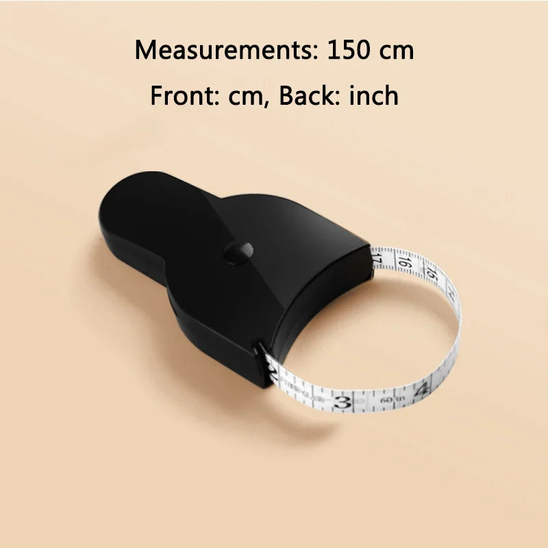 A black automatic retractable body measuring tape is shown next to a white tape measure for scale.