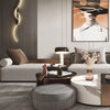 A modern minimalist LED wall lamp illuminates a stylish interior space with warm light.