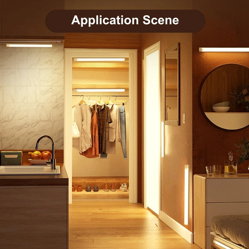 Interior scene showing a modern bathroom or closet with recessed LED lighting and wooden cabinetry.