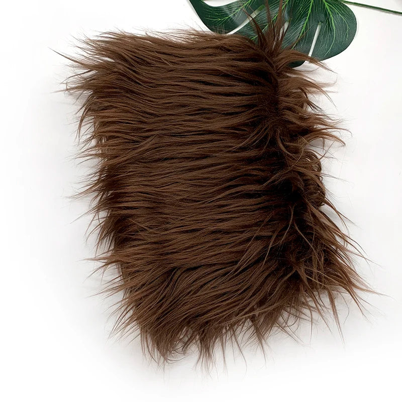A pile of dark brown soft faux fur fabric used for DIY sewing, doll hair, and cosplay.