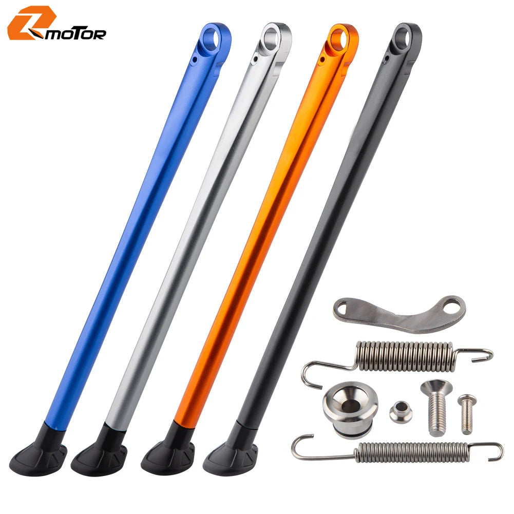 Set of four aluminum motorcycle side stand kits in blue, silver, orange, and black with ABS feet