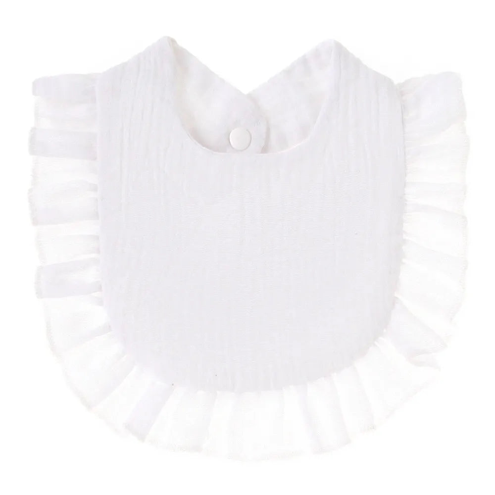 White soft cotton baby bib in a bandana style with ruffled edges