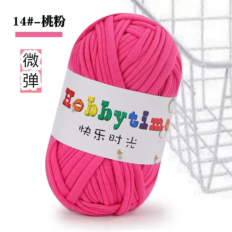 A ball of bright pink soft T-shirt yarn for crochet and knitting is shown against a white background.
