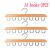Set of 14 wooden hooks in three pieces for hanging belts, hats, and accessories