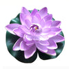 A vibrant purple lotus flower with green leaves used for pond and garden decor.
