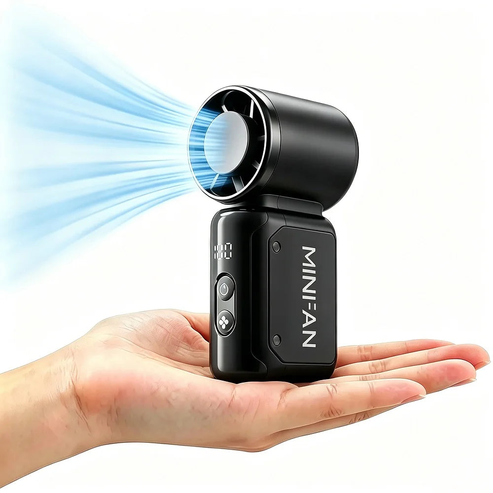 Eine Hand hält einen schwarzen tragbaren Mini-Turbo-Lüfter mit LED-Anzeige und blauer Luftströmung.
