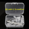 Clear storage box containing 20 nose pads and a screwdriver for glasses repair