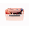 A pink felt purse organizer insert showing various small accessories and compartments.