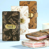 A set of brown and beige cartoon bear lockable money organizer notebooks with gold accents.