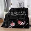 A black fleece throw blanket featuring a graphic design of the My Chemical Romance band.
