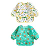 A pack of yellow and green patterned waterproof long-sleeve baby bibs with adjustable fit.