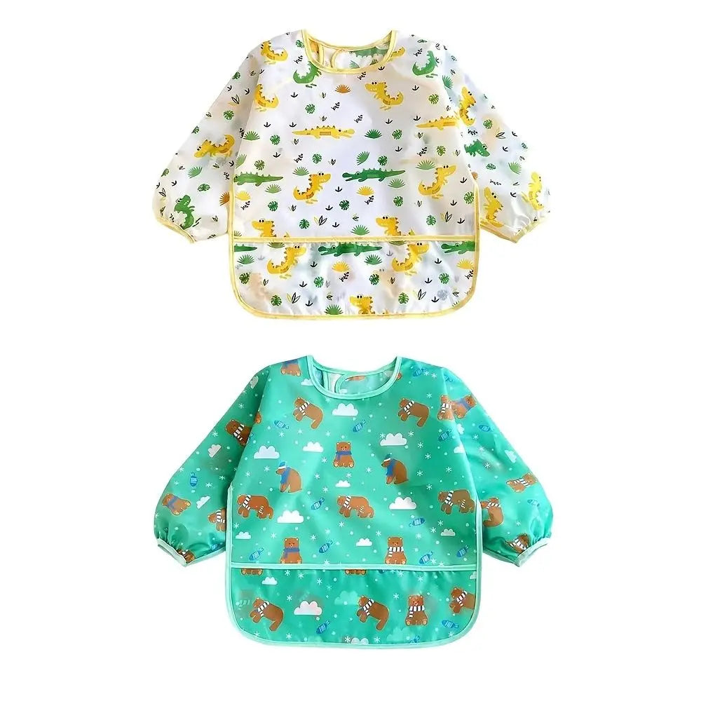A pack of yellow and green patterned waterproof long-sleeve baby bibs with adjustable fit.