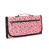 A pink and black leopard print foldable waterproof baby changing pad with a carrying handle.