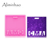A pink silicone resin mold and a purple glitter mold for making badge backings and keychains