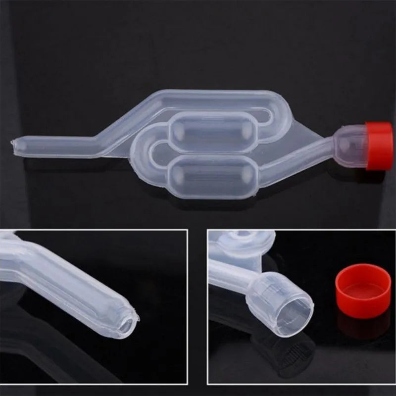 Clear plastic combustion leak tester kit with five small fluid containers and a red cap