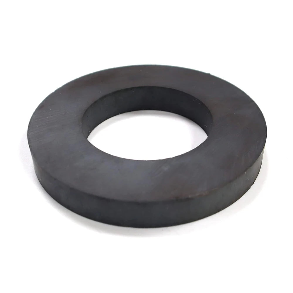 A black ceramic ring magnet with a center hole, industrial grade 8 ferrite for science and DIY projects.