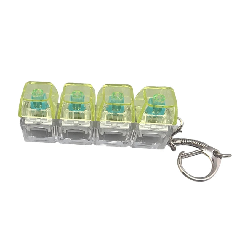 A set of five clear LED light-up keyboard fidget toys attached to a silver keychain ring.