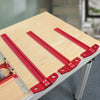 A red precision aluminum alloy T-ruler used for woodworking marking on a wooden surface.
