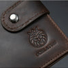 A dark brown leather wallet featuring an embossed lion head design and stitching.