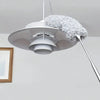 A white flexible microfiber duster with a fluffy gray head is suspended from a rod.