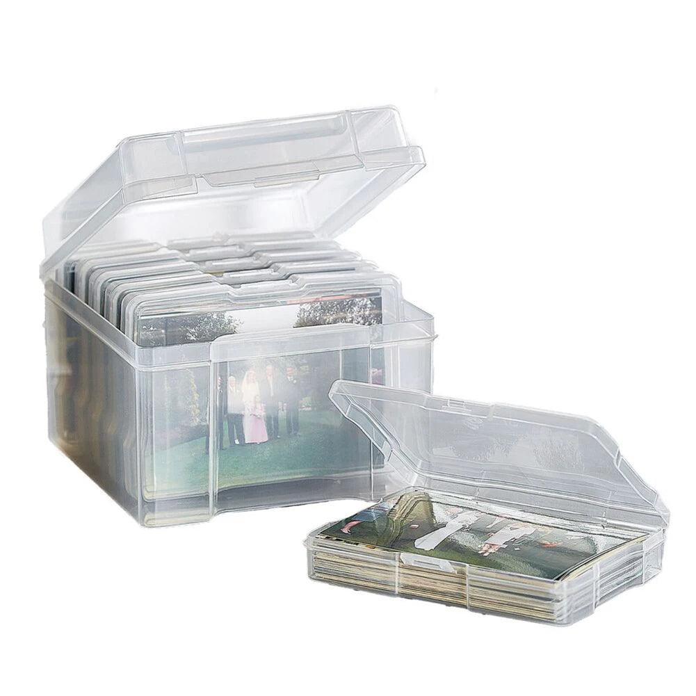 Clear photo storage boxes with lids and stacks of 4x6 pictures inside