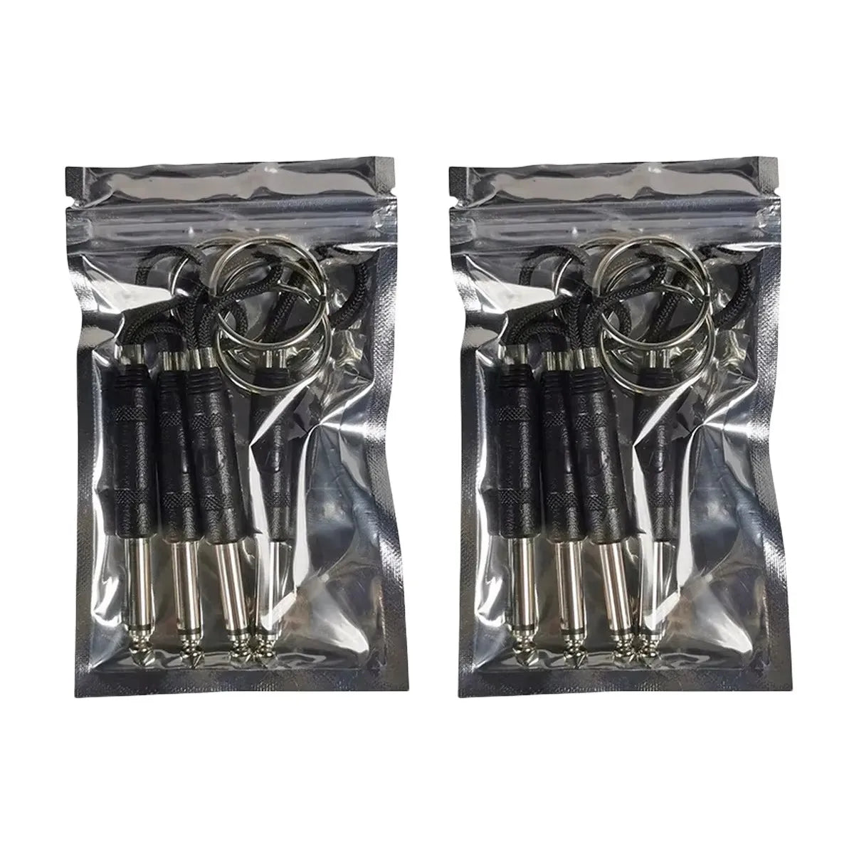 A pair of vintage guitar amplifier wall key holders packaged in a clear plastic pouch.