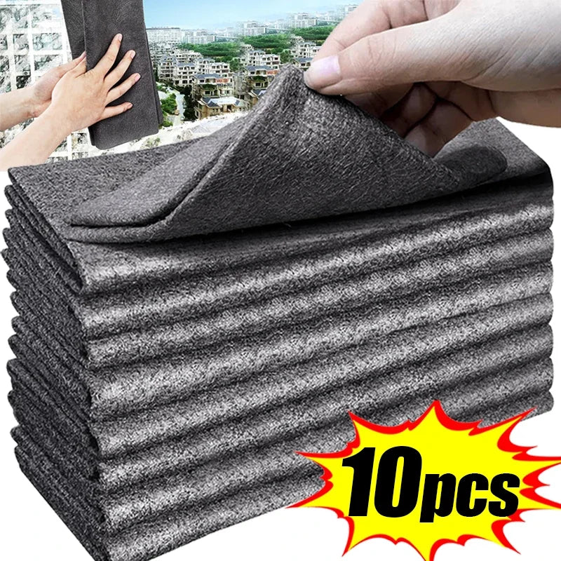 A stack of gray microfiber cleaning cloths is shown next to a hand, indicating a multi-pack product.