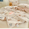 A beige lace-trimmed breathable summer duvet with a light floral pattern is displayed on a bed.