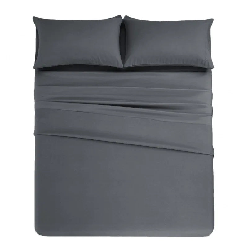 Ensemble de literie gris en microfibre comprenant un oreiller et une drap-housse.