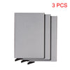 Three slim gray metal RFID blocking card holders with a pop-up design