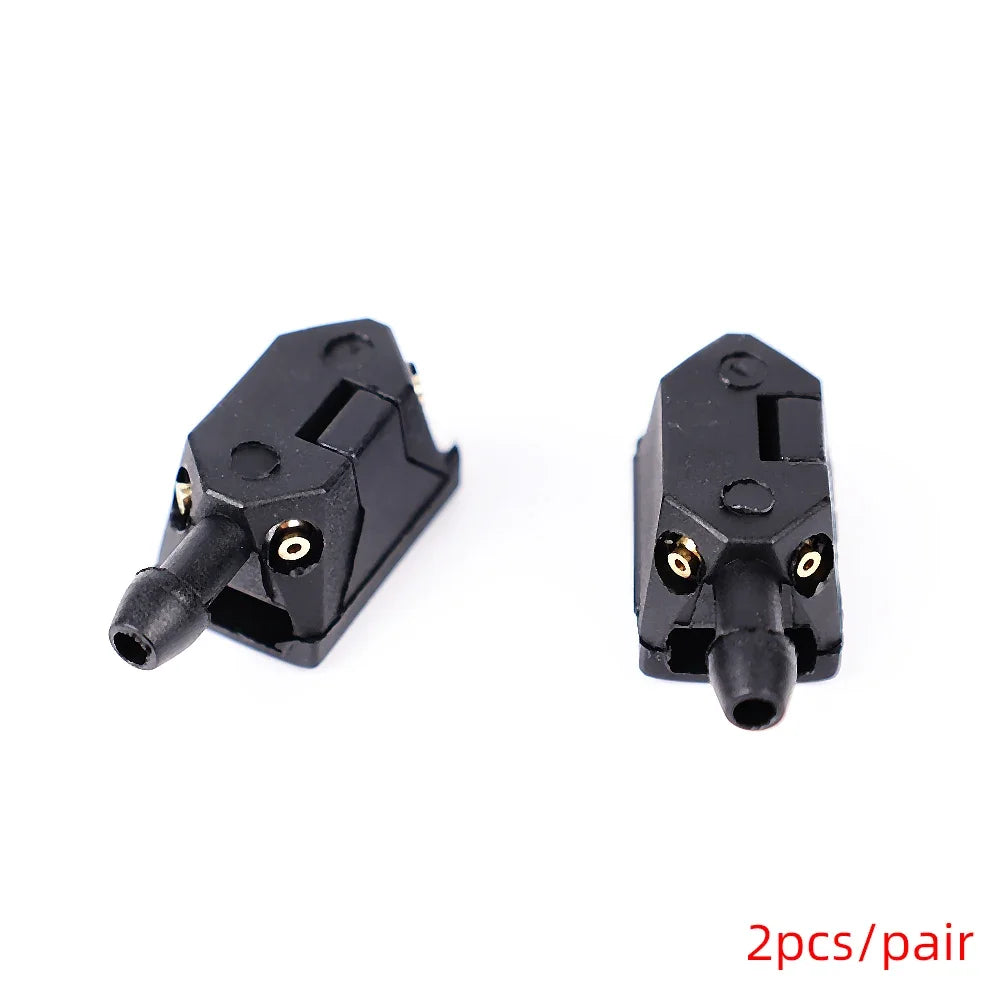 A pair of black 4-way adjustable car windshield washer nozzles.