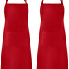 A pair of solid red adjustable kitchen aprons with pockets.
