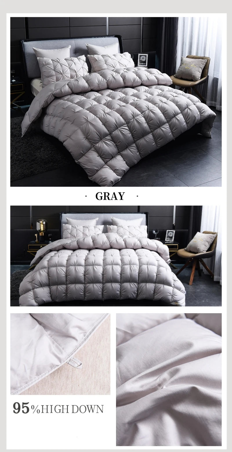 A gray quilted duvet and bedding set displayed on a bed in a modern bedroom setting.