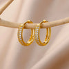 Boucles d'oreilles créoles en zircon cubique ton or