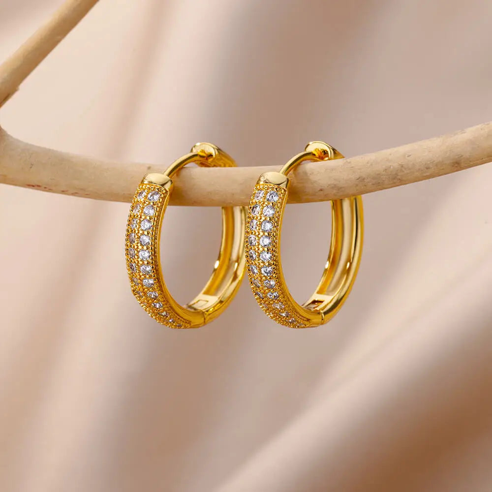 Boucles d'oreilles créoles en zircon cubique ton or