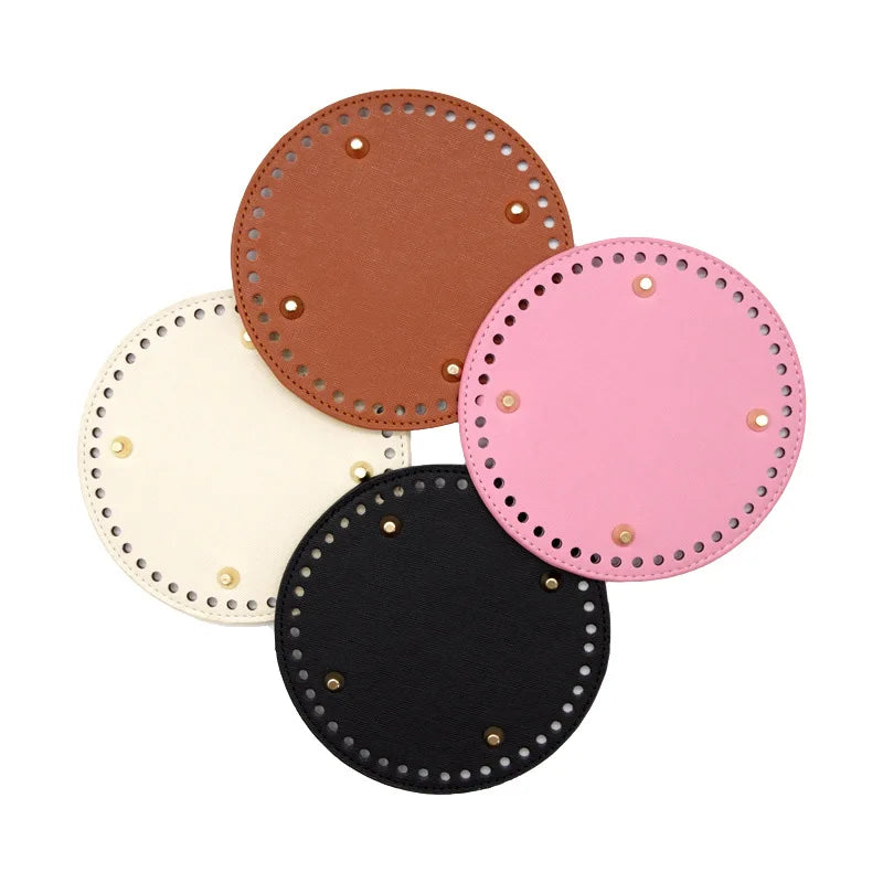 Three oval PU leather bags in brown, pink, and black with stud detailing.