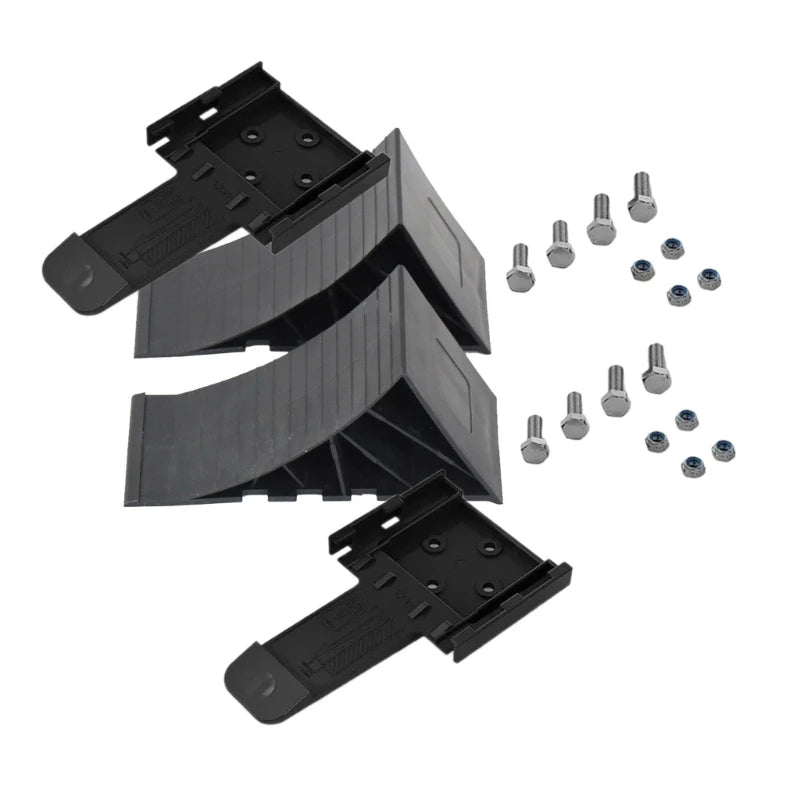 Black heavy-duty rubber wheel chocks with non-slip grip and mounting hardware.