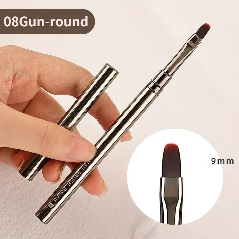 A hand holds a precision nail art brush set with a 9mm tip, showing the brush and its size.